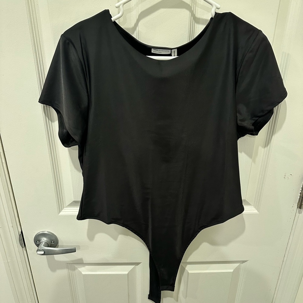ASOS black short sleeve  bodysuit, high cut size 12, never worn